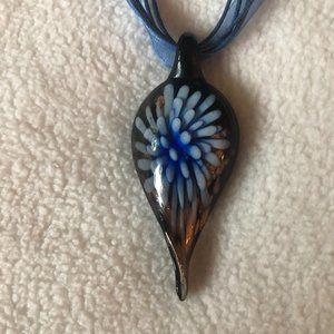Unique 10" necklace w/ Blue flower and Gold/Bronze reflection hung w/ribbon cord
